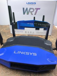 wireless router on table with box