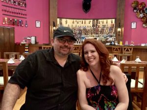 man and woman in restaurant