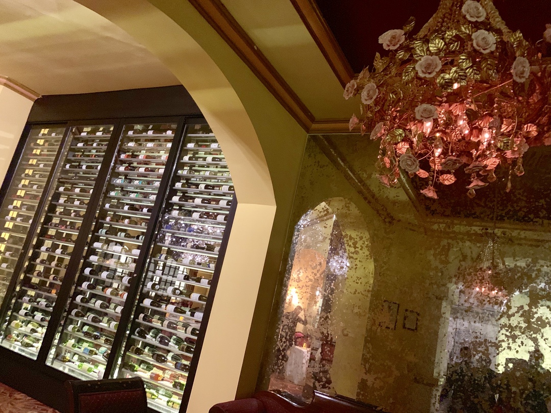 wine cellar with flower chandelier