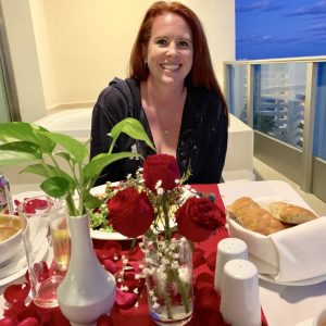 woman with food and flowers
