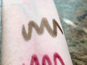 gold makeup swatch on arm