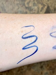 swatch of blue liner on arm