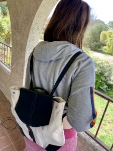 teen girl wearing a backpack