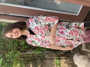 girl in floral robe