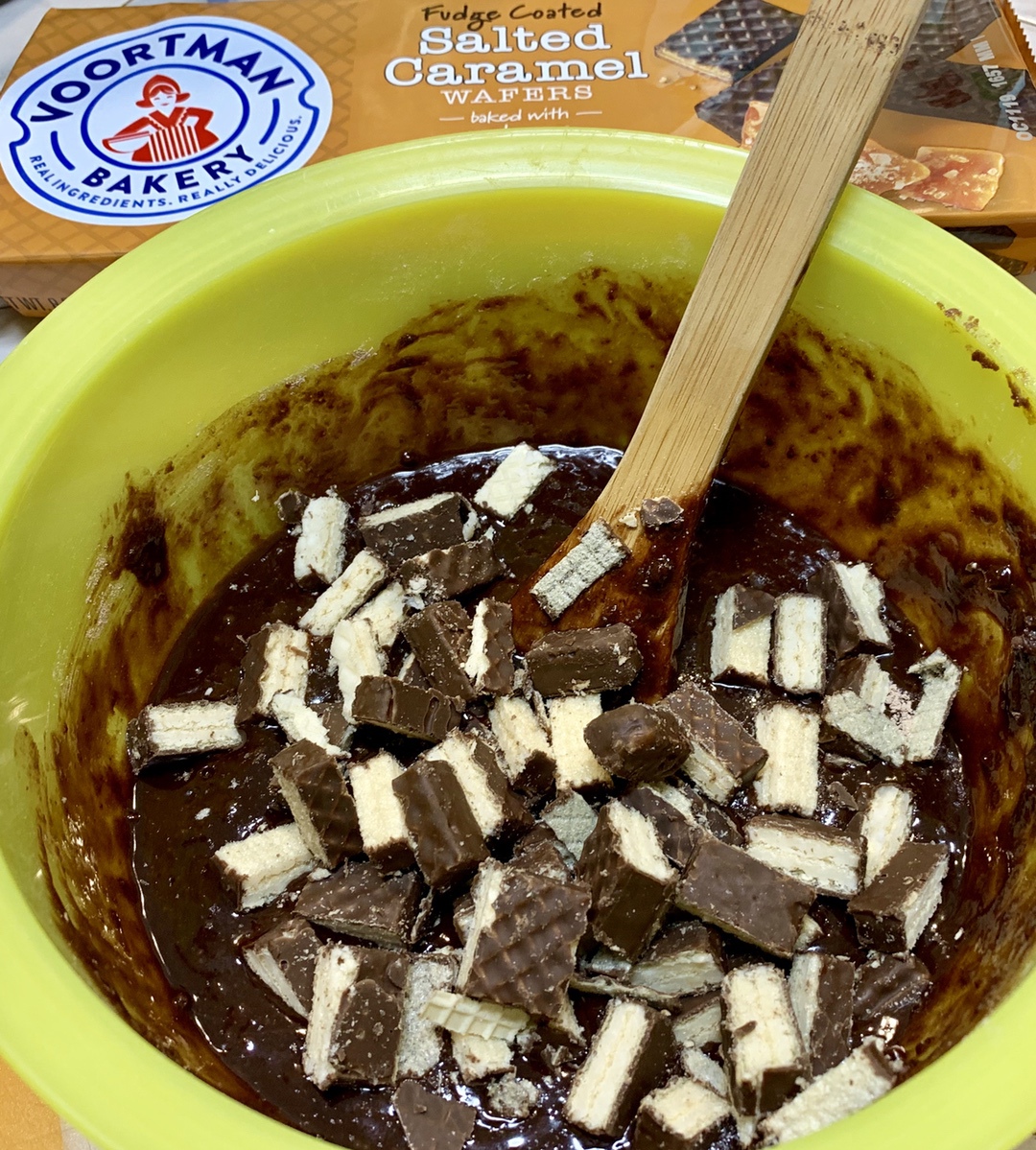 brownie batter with cut up wafers in bowl