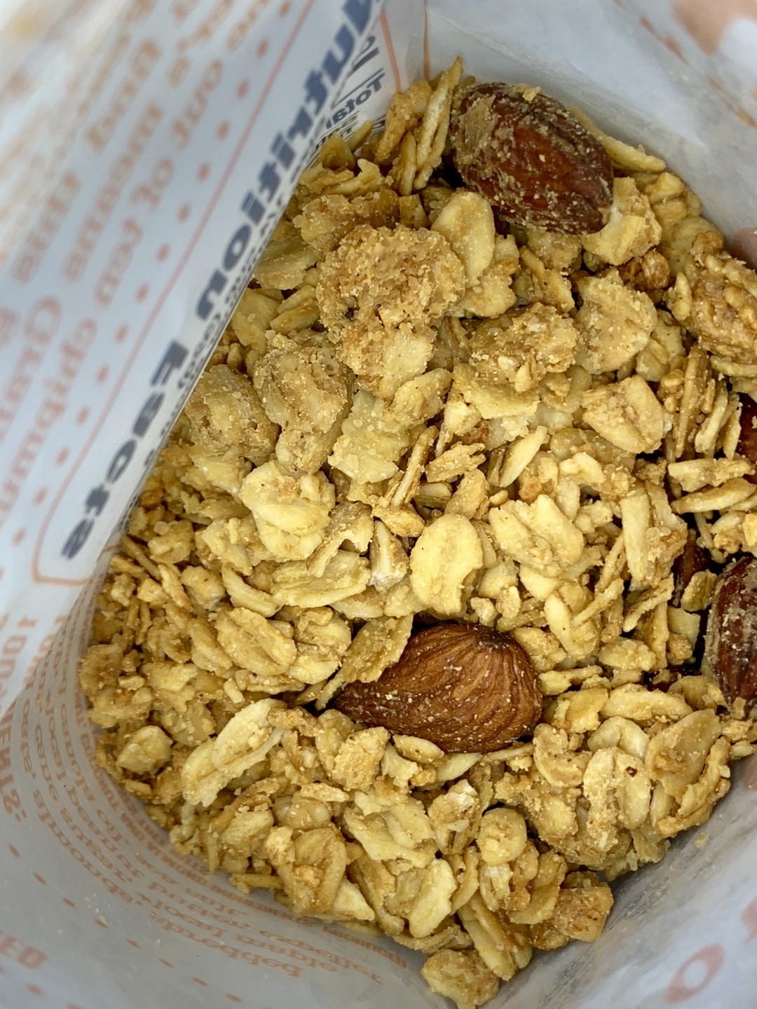 granola with peanut butter, almonds and maple syrup