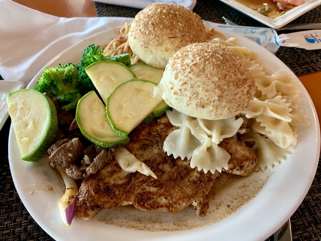 burger and pasta and vegetables