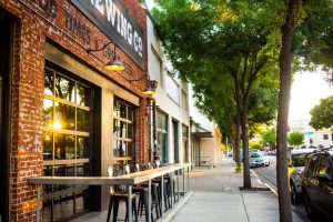tables and chairs outside brewery