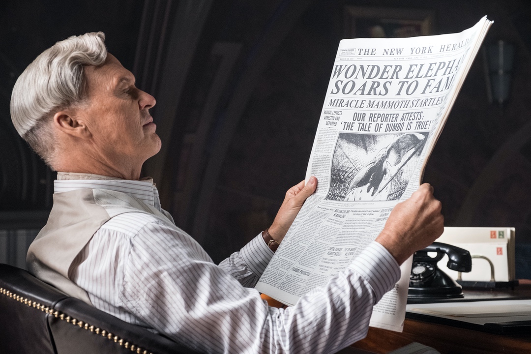 man reading newspaper