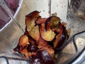 Plum pieces in blender