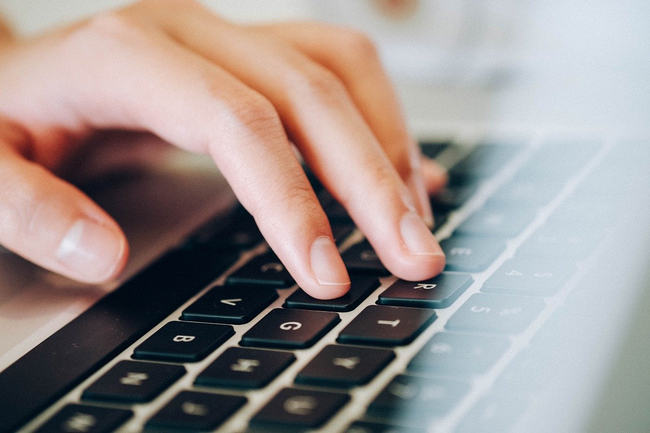 laptop keyboard hand