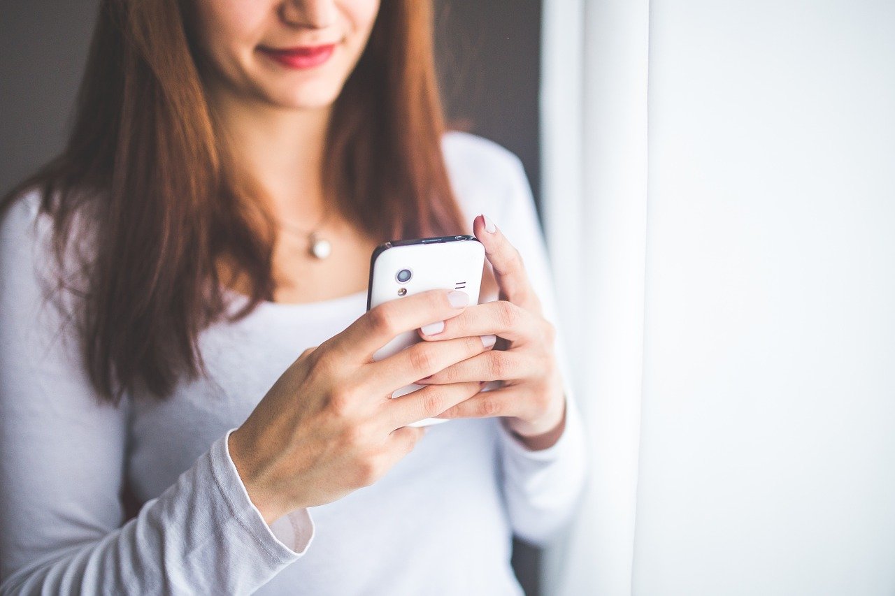 mom texting hand Bright by Text