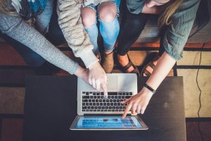 laptop with hands