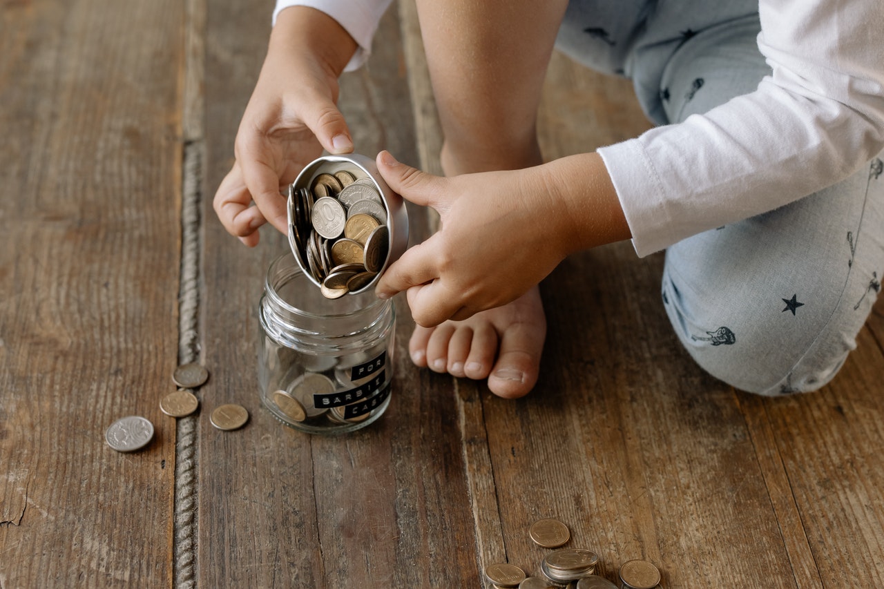 child with money