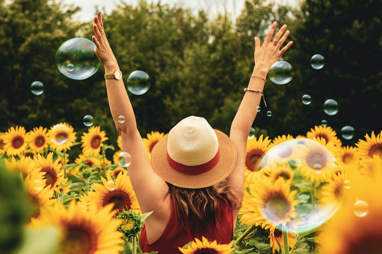 happy woman in flowers