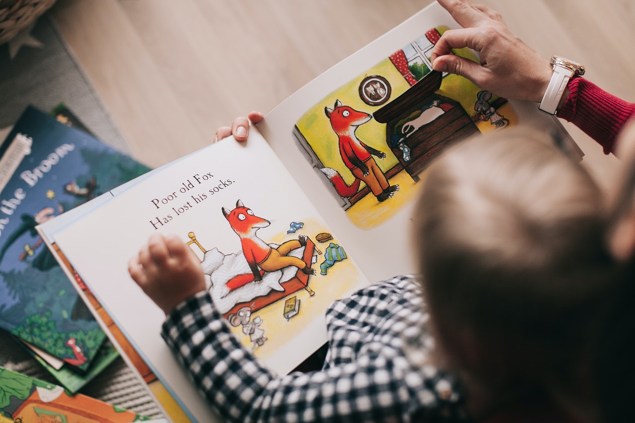 baby child reading book