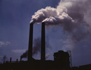 A factory with smoke coming out of it