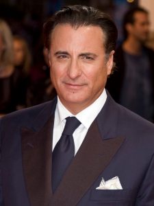 Andy Garcia wearing a suit and tie