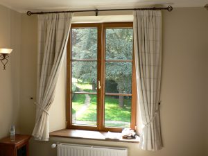 A bedroom with a large window