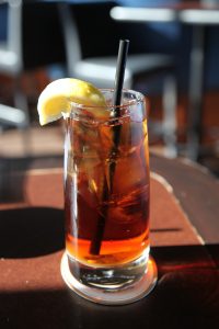 iced tea in glass with straw