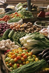 A bunch of different vegetables on display