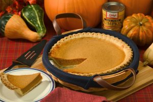 pumpkin pie in tin on a table