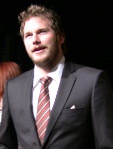 Chris Pratt wearing a suit and tie