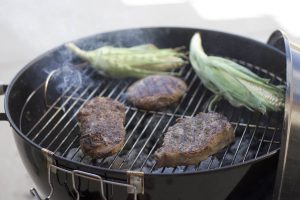 A pan of food on a grill