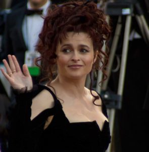 Helena Carter standing in front of a mirror posing for the camera