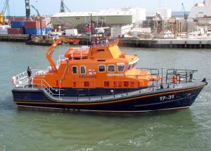 A small boat in a large body of water