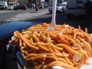 A close up of a pile of fries