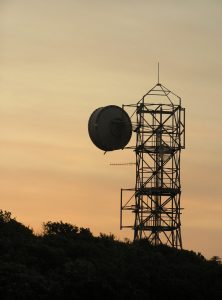 A large tall tower with a clock