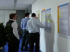 A group of people standing in a room